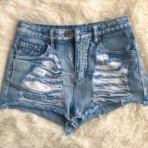 Ripped jean shorts front and back.
